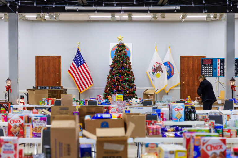 Tables of collected items fill the Bridgeview Community Center.