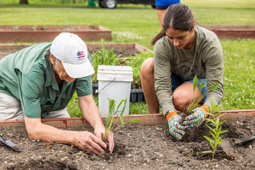 Mr. Ejma worked hard planting native plants with Lyons Township Interns.