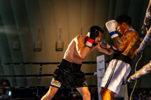 Evan Jack corners Tristian Gallichan for his first win.