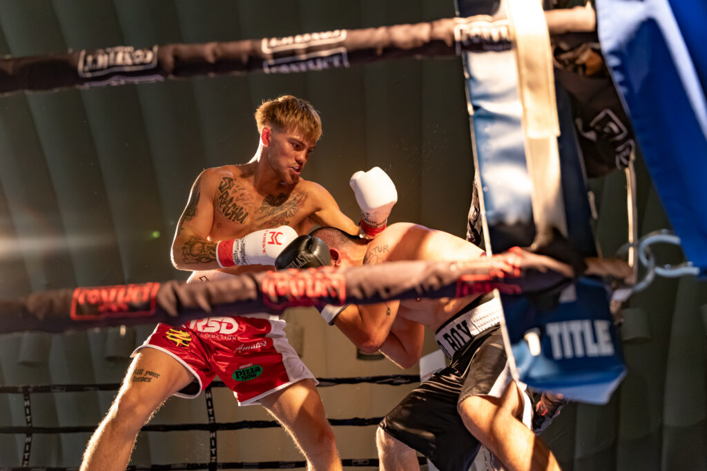 Raymond “Bad Boy” Chacon ducks to avoid Luka Moldenhauer’s swing.