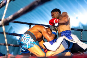 Undefeated Eric “Izzo” Emery lands a hit on Jonah Cahill.