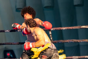 Marco “Super Fly” Garcia strikes Elijah Hasman as he recoils.