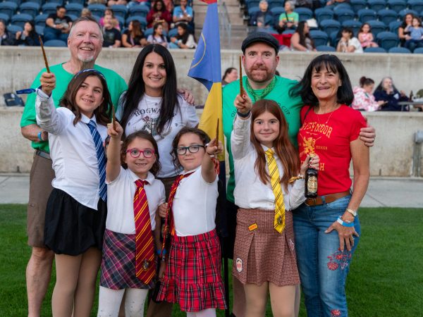 A family of wizards enjoy a beautiful night at SeatGeek Stadium